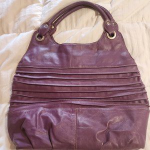 Women purple handbag